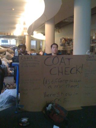 Protesters man the coat check in the UFT building at 52 Broadway